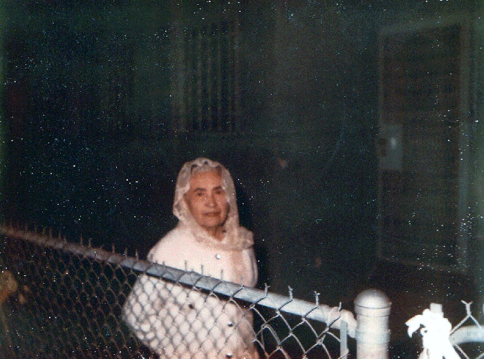 In her backyard on 111th.